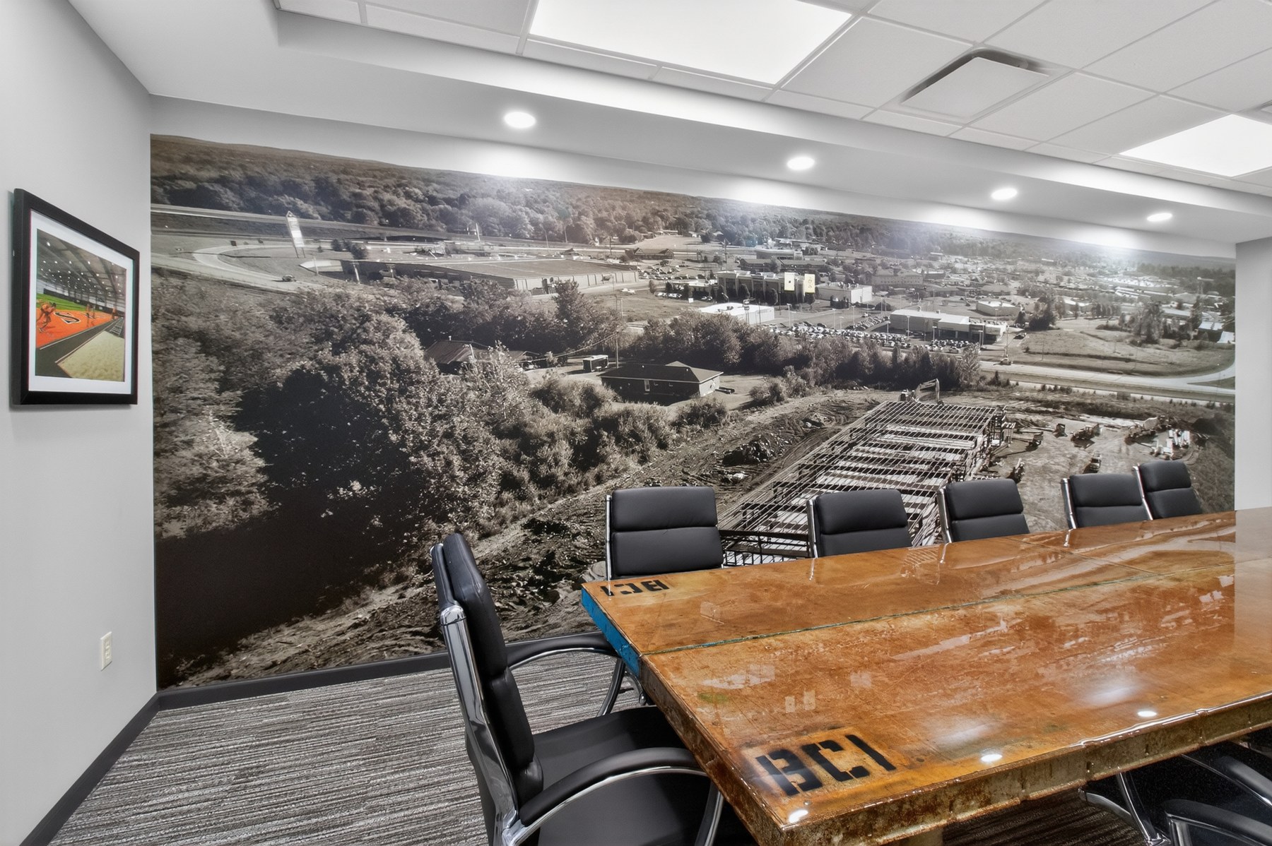 Commercial conference room with custom wall mural - HelixMind Real Estate Media