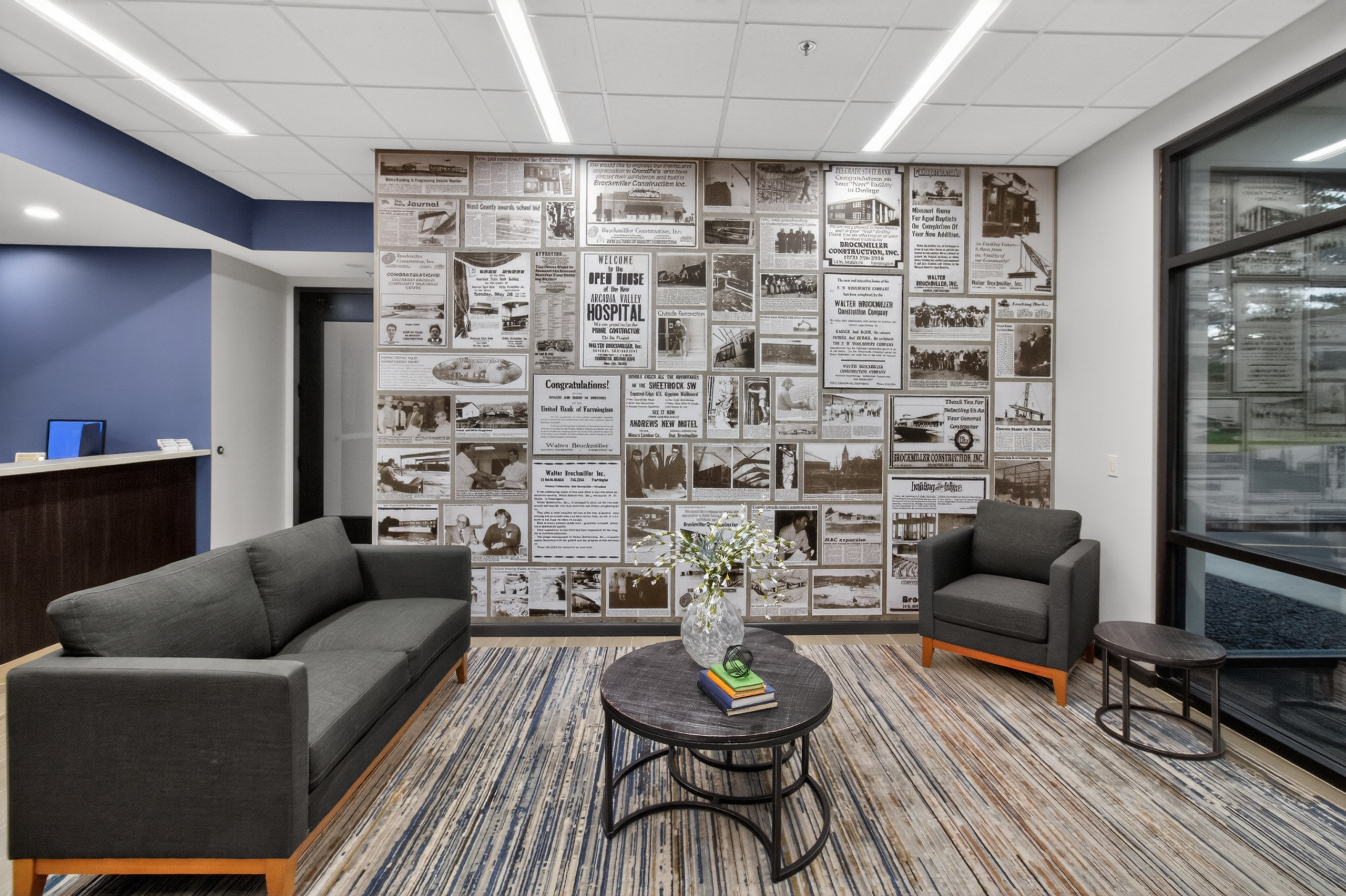 Commercial lobby with historic newspaper feature wall - HelixMind Real Estate Media