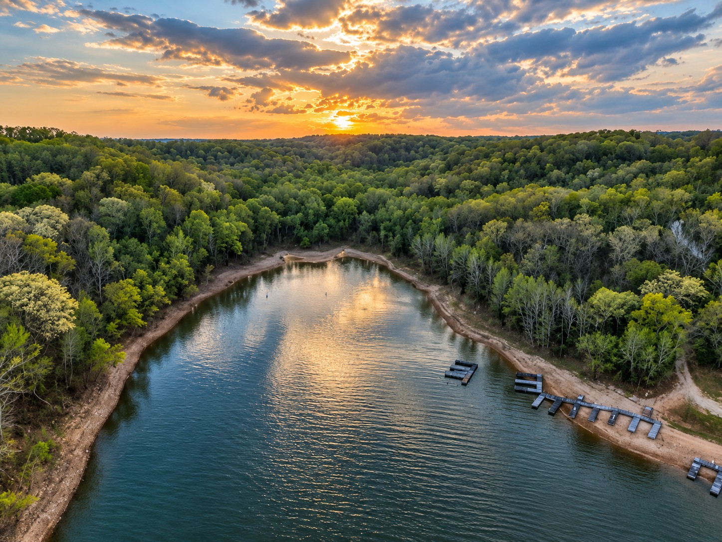 Drone aerial photography over lake with boat docks