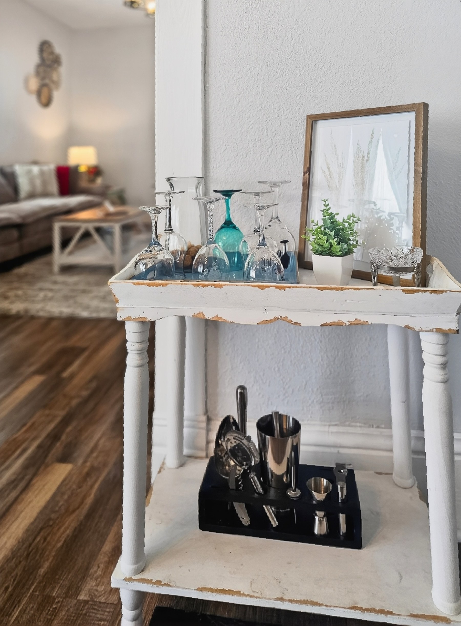 Styled bar cart with glassware and cocktail tools - HelixMind Real Estate Media