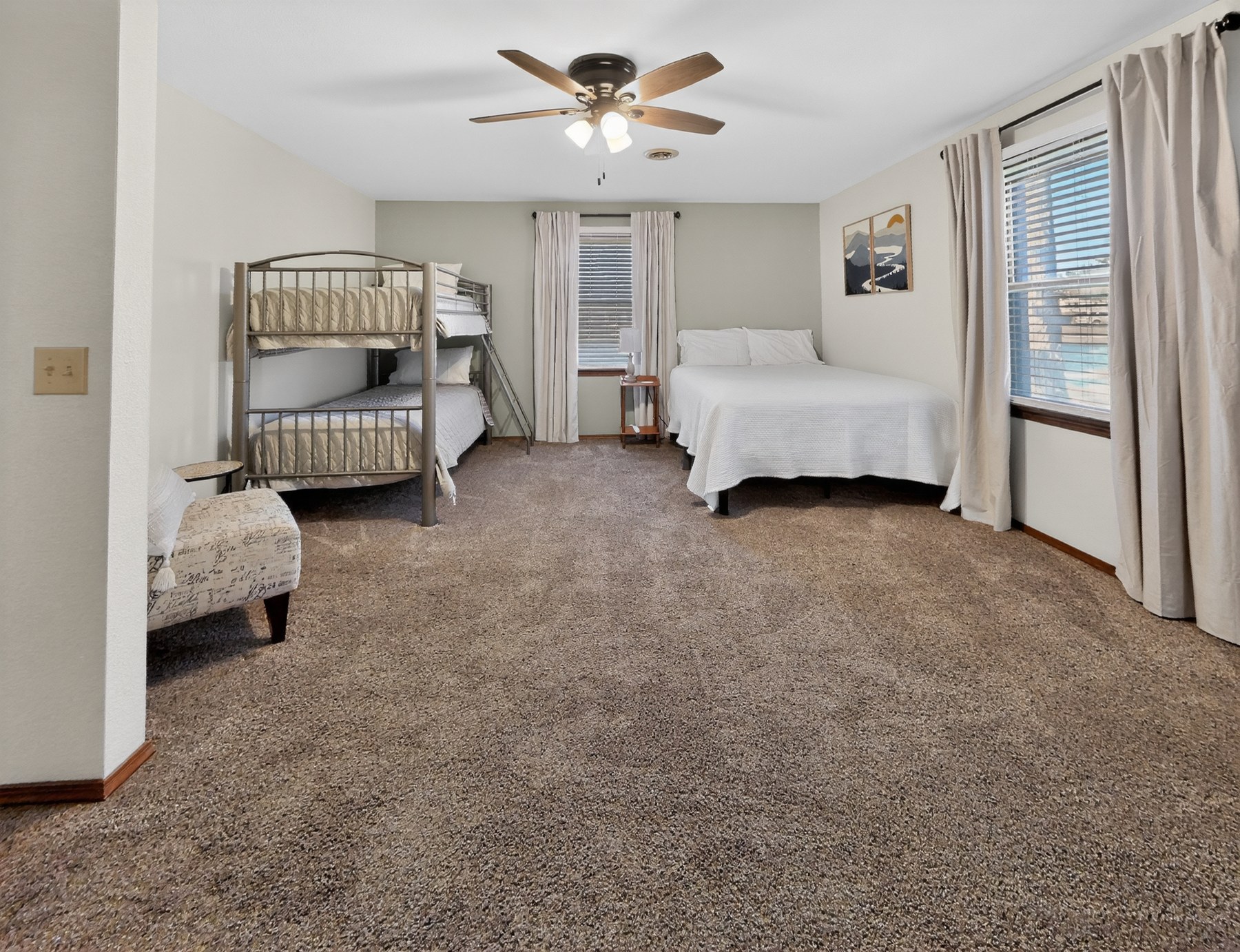 Bunk room with queen bed and bunk beds - HelixMind Real Estate Media